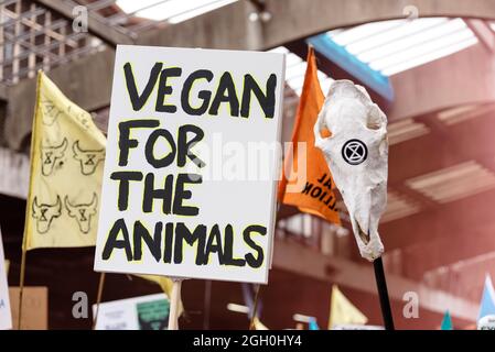 London, UK. 28 August 2021. Animal Rebellion and Extinction Rebellion supporters march during the 'National Animal Rights March'. Stock Photo