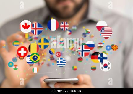 Digital concept of Global communication, floating national flags of the world Stock Photo