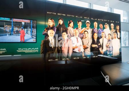 A photograph of some of the construction, engineering, architecural teams that worked on the Burj Khalifa. In Dubai, United Arab Emirates. Stock Photo