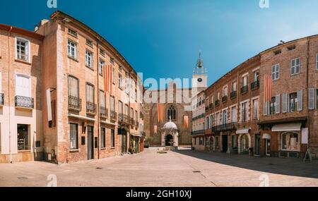 Perpignan, France. Leon Gambetta Square And Cathedral Basilica Of Saint John The Baptist Of Perpignan In Sunny Summer Day.