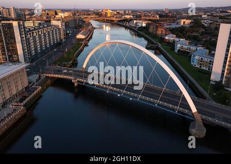 Glasgow, Scotland, 1 September 2021. PICTURED: The Clyde Arc (known locally as the Squinty Bridge). Drone aerial view looking down from above of the COP26 venue which takes place at Glasgow’s SEC (Scottish Event Campus) which was formerly known as the SECC (Scottish Exhibition and Conference Centre) along with the SEC Armadillo and SSE Hydro Arena which forms the new campus. The Climate Change conference COP26 will be hosted here from 1st to 12th November this year.  Credit: Colin Fisher.