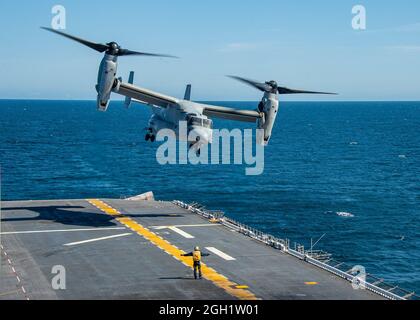 PACIFIC OCEAN (March 21, 2021) An MV-22 Osprey tiltrotor aircraft attached to Marine Medium Tiltrotor Squadron (VMM) 165 (Reinforced), 11th Marine Exp
