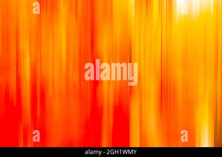 vertical orange yellow motion blur lines abstract background Stock Photo