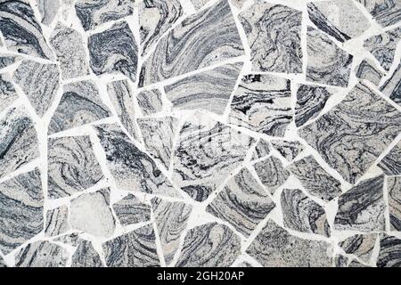 Gray, black and white mosaic floor. Stone floor. Stone background. Stock Photo