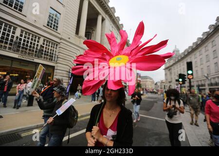 London, England, UK. 4th Sep, 2021. Climate change campaign group Extinction Rebellion march through central London in the 13th day of their planned 2 weeks of action. (Credit Image: © Tayfun Salci/ZUMA Press Wire) Stock Photo