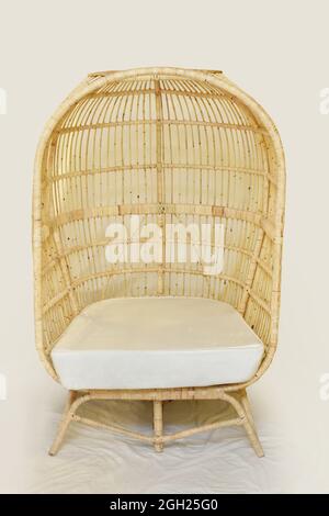 cane egg chair with white background. Stock Photo