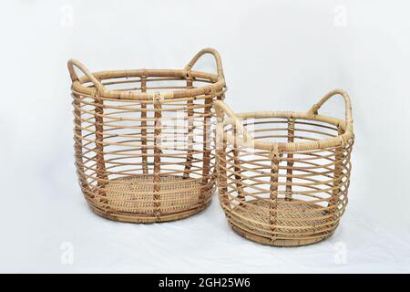 cane rattan Landry round basket set on white background selective soft focus Stock Photo