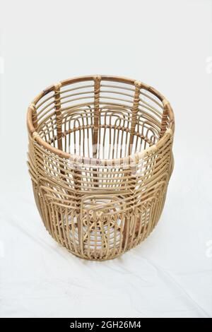 cane round basket on white background selective soft focus Stock Photo