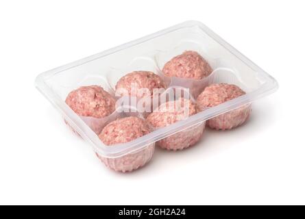 Fresh raw turkey meatballs in plastic disposable tray isolated on white Stock Photo