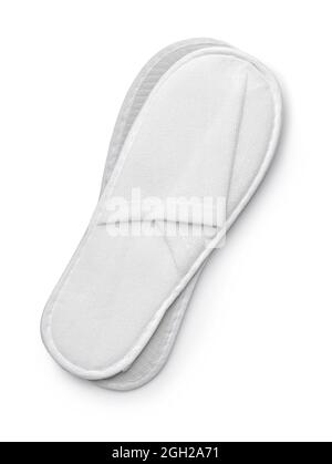 Top view of white disposable slippers isolated on white Stock Photo