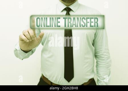 Hand writing sign Online Transfer. Business concept authorizes a fund transfer over an electronic funds transfer Presenting New Plans And Ideas Stock Photo