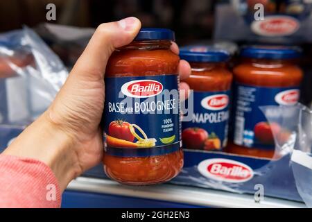 Tyumen, Russia-june 08, 2021: Sauce Barilla, the most famous pasta Italian brand. Buying products in a hypermarket Stock Photo