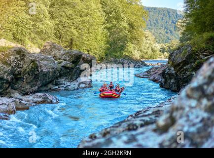 rafting on a large boat on a mountain river Stock Photo