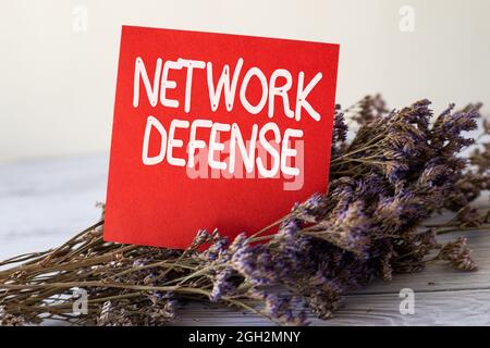 Handwriting text Network Defense. Business concept easures to protect and defend information from disruption Blank Piece Of Sticky Note Placed On Top Stock Photo