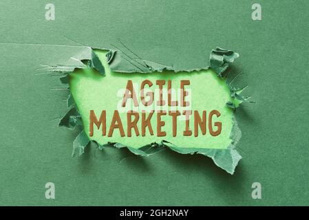 Hand writing sign Agile Marketing. Conceptual photo focusing team efforts that deliver value to the endcustomer Thinking New Writing Concepts Stock Photo