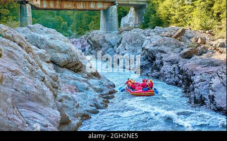 rafting on a large boat on a mountain river Stock Photo