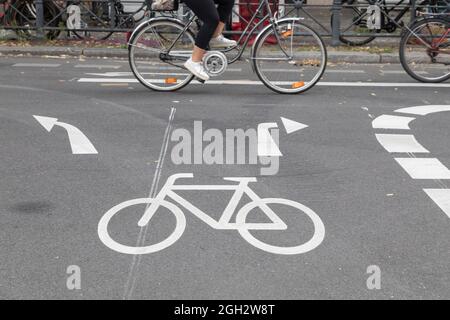 road signs on bicycle lane in Berlin Stock Photo