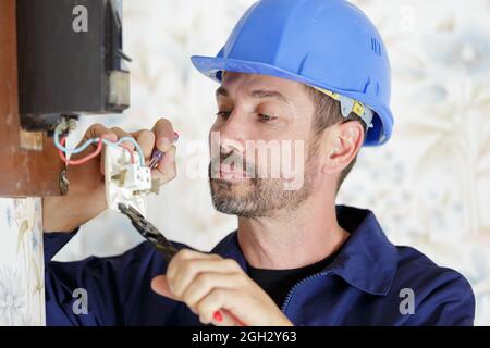 a male technician with cables Stock Photo