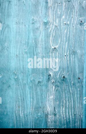 Vertical shot of a turquoise weathered rustic plank wooden background Stock Photo