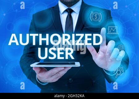 Text caption presenting Authorized User. Word for person granted permission to manage access or make decisions Man In Office Uniform Standing Pressing Stock Photo