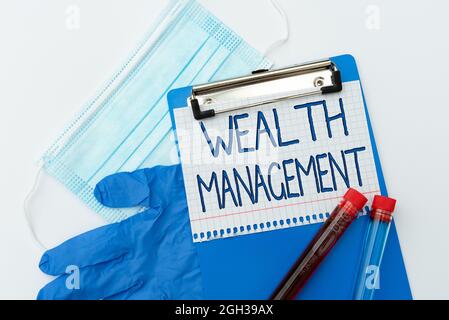 Conceptual caption Wealth Management. Word for performance tracking of the funds as per regular market Preparing And Writing Prescription Medicine Stock Photo