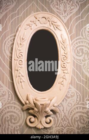 Ancient vintage frames for pictures or photos on the wall. Frames for photographs or paintings in the style of the Renaissance Stock Photo