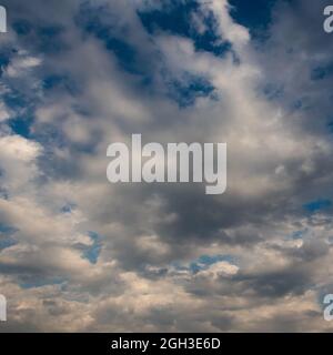 white and gray clouds in a blue sky Stock Photo
