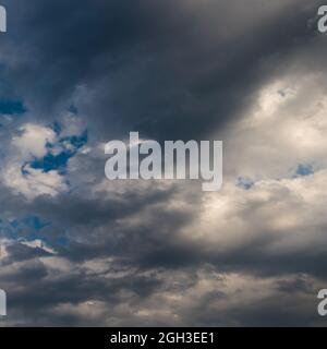 white and gray clouds in a blue sky Stock Photo