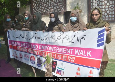 Lahore, Pakistan. 04th Sep, 2021. Pakistani traffic police women ride their motorbikes and others take a part during the women safety and empowerment march rally in Lahore. Punjab Police launches a women safety app and anti women harassment cell help line no 1242. (Photo by Hussain Ali/Pacific Press) Credit: Pacific Press Media Production Corp./Alamy Live News Stock Photo