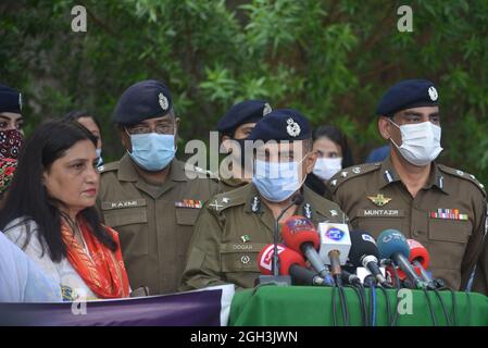 Lahore, Pakistan. 04th Sep, 2021. Pakistani traffic police women ride their motorbikes and others take a part during the women safety and empowerment march rally in Lahore. Punjab Police launches a women safety app and anti women harassment cell help line no 1242. (Photo by Hussain Ali/Pacific Press) Credit: Pacific Press Media Production Corp./Alamy Live News Stock Photo