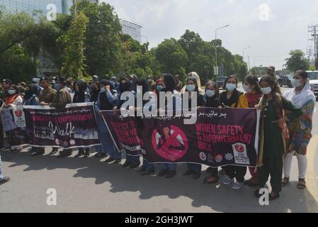 Lahore, Pakistan. 04th Sep, 2021. Pakistani traffic police women ride their motorbikes and others take a part during the women safety and empowerment march rally in Lahore. Punjab Police launches a women safety app and anti women harassment cell help line no 1242. (Photo by Hussain Ali/Pacific Press) Credit: Pacific Press Media Production Corp./Alamy Live News Stock Photo