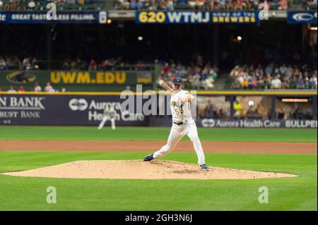 Milwaukee, USA. 03rd Sep, 2021. September 03, 2021: Milwaukee Brewers  center fielder Lorenzo Cain #6 advances to second on Milwaukee Brewers  starting pitcher Aaron Ashby #26 sacrifice bunt during MLB baseball game