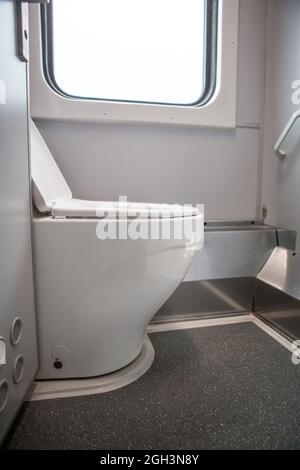 Classic toilet interior on the train. Toilet in the passenger train Stock Photo