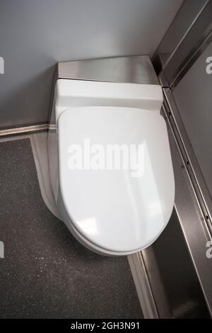 Classic toilet interior on the train. Toilet in the passenger train Stock Photo