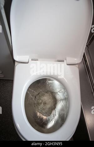 Classic toilet interior on the train. Toilet in the passenger train Stock Photo