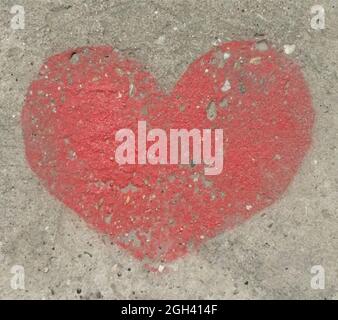 Red painted heart grunge background. Vector illustration. Sprayed sign on gray concrete Stock Vector