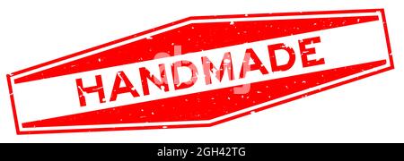 Grunge red handmade word hexagon rubber seal stamp on white background Stock Vector