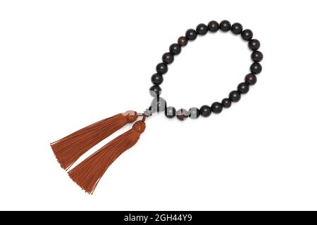 Buddhist rosary called Juzu. Buddhist tool used for praying at funeral Stock Photo