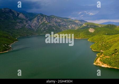 Aerial view of a Vau Dejes reservoir on Drin river, with a hydroelectric dam on it, Albania Stock Photo