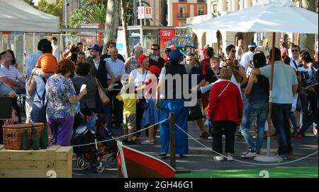 BARCELONA, SPAIN - Sep 24, 2010: A crowd outdoors in Barcelona, Spain during the local La Merce holiday Stock Photo