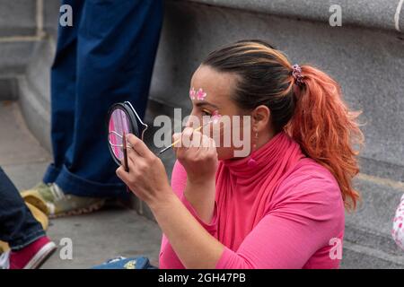 London, UK. 04th Sep, 2021. A protester paints her face before the Extinction Rebellion's 'March for Nature' on the last day of the 14 days of the Impossible Rebellion action about how nature is in Crisis, with a species goes extinct every 5 minutes. (Photo by Dave Rushen/SOPA Images/Sipa USA) Credit: Sipa USA/Alamy Live News Stock Photo