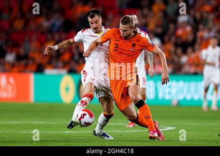 EINDHOVEN, NETHERLANDS - SEPTEMBER 4: Stefan Mugosa of Montenegro and Matthijs de Ligt of the Netherlands battle for possession during the 2022 FIFA World Cup Qualifier match between Netherlands and Montenegro at the Philips Stadion on September 4, 2021 in Eindhoven, Netherlands (Photo by Herman Dingler/Orange Pictures) Credit: Orange Pics BV/Alamy Live News Stock Photo