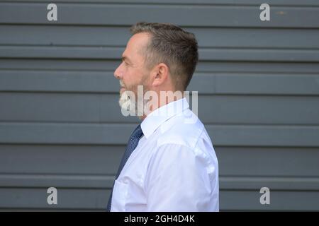 Side view of a businessman turned watching to side with a thoughtful expressionportrait Stock Photo