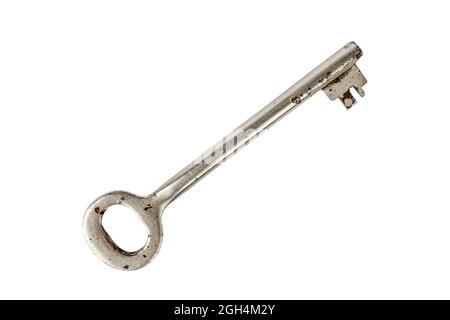 Shiny key. The key to the lock. Old key. View from above. Metal key. Isolate on white. Stock Photo
