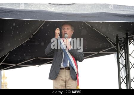 Paris, France. 4th Sep, 2021. Head of Debout la France  and MP Nicolas Dupont-Aignan speaks during the demonstration against the latest health measure. Stock Photo