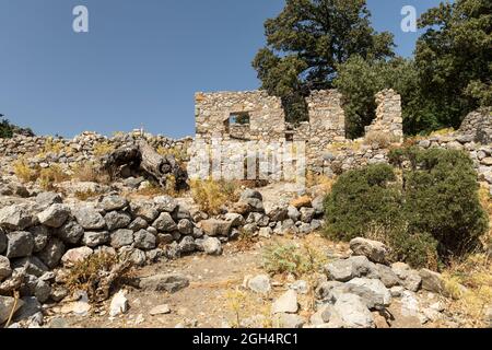 The ruins of the old village of Pyli / Paleo Pyli situated west of Mount Dikeos, Kos, Dodecanese Islands, Greece Stock Photo