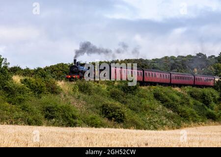 Locomotive no 564 pulling an up train from Sheringham to Weybourne Stock Photo