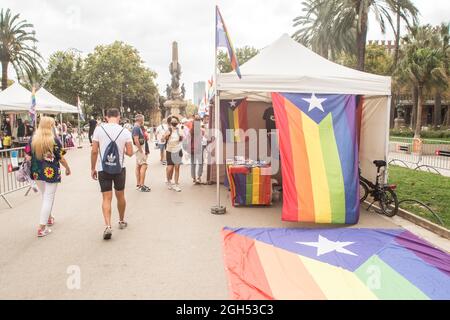 September 4, 2021, Barcelona, Catalonia, Spain: Catalan independence flags with LGTBI + colors are seen in a fair tent..Fair of LGTBI + entities, in the pride of Barcelona 2021, which has been held under the theme ''together against the stigma of HIV'', on a rescheduled date that Saturday, September 4, without festive or musical activities due to the incidence of the pandemic of Covid-19. (Credit Image: © Thiago Prudencio/DAX via ZUMA Press Wire) Stock Photo