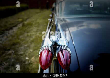 Tail lights on the tail fin of a classic American road cruiser Stock Photo