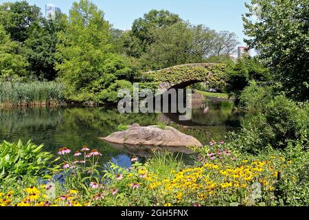 New York City summer in Central Park at the Gapstow bridge Stock Photo